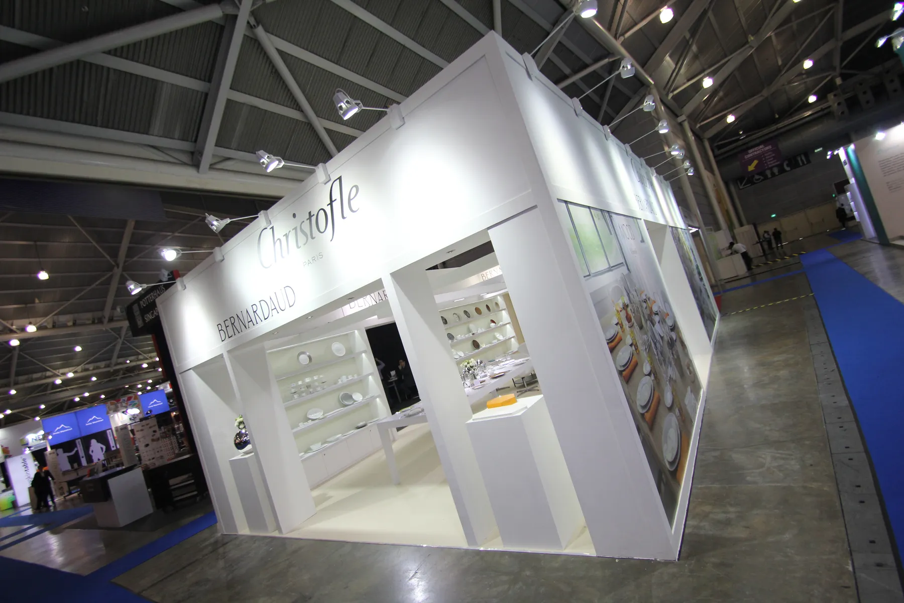 Custom white exhibition stand with angular architecture built by Joko Expo Global